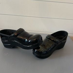 Dansko Nurse Clogs. Black with iridescent tint.